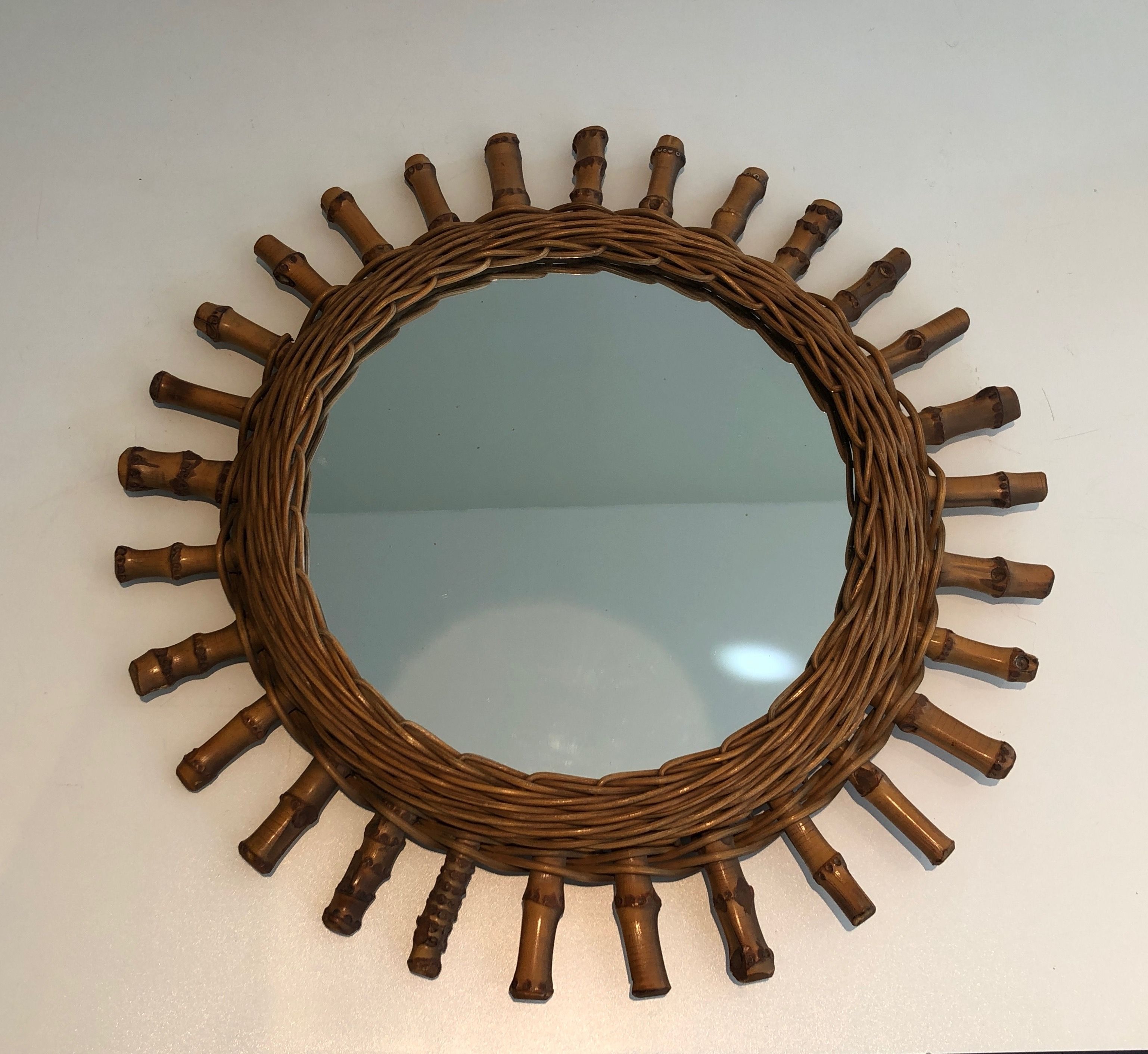 Round rattan mirror