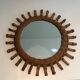 Round rattan mirror