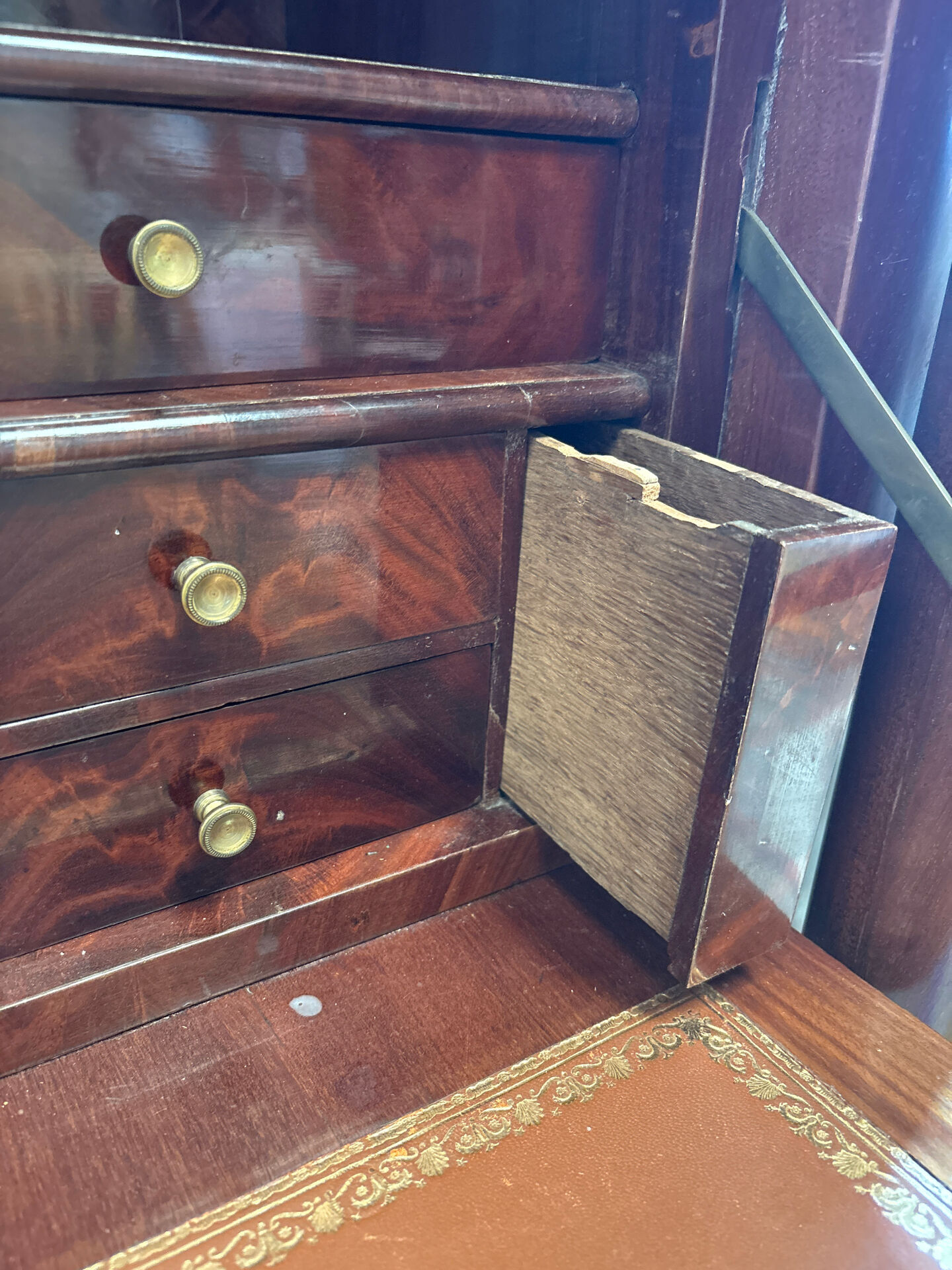 Empire secretary in mahogany, bronze and marble with secret drawers.