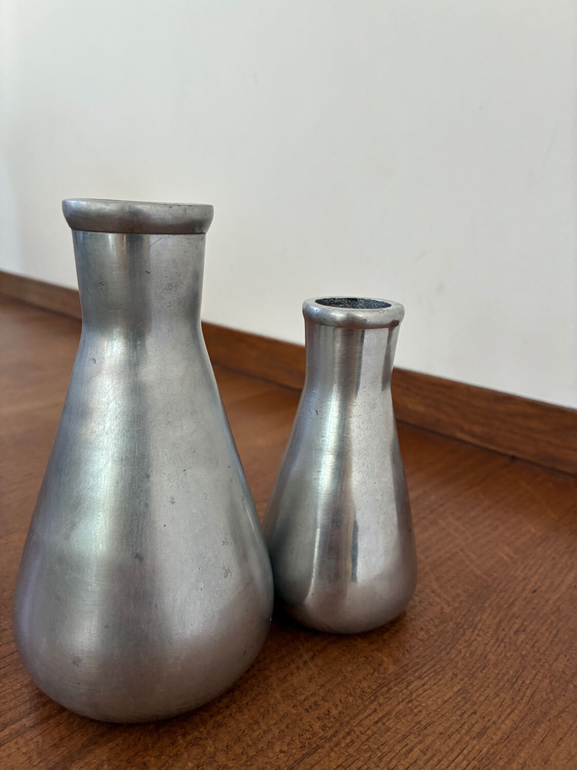 Vintage pair of chrome vases from the 1970s.