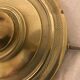Brass lamp with removable ring around a globe