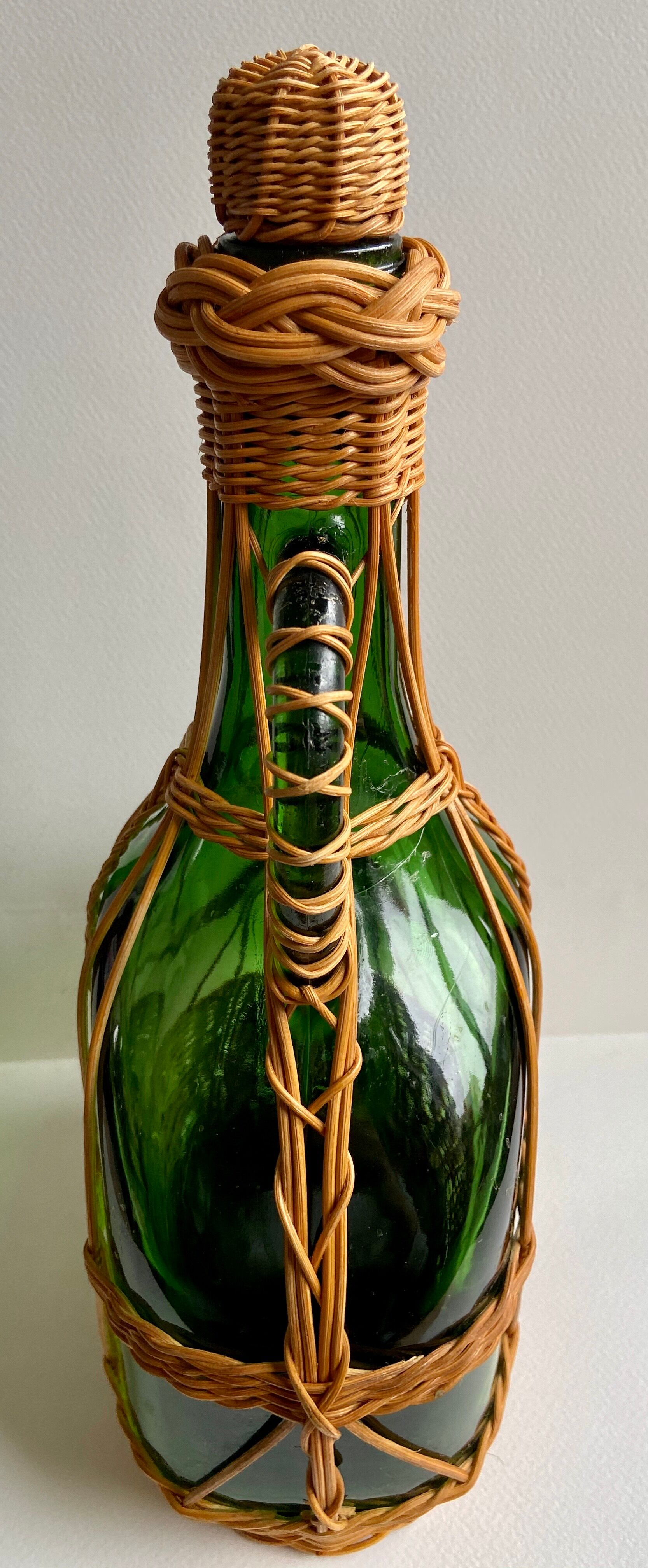 Wicker and glass bottle