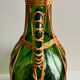 Bouteille en osier et verre