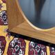 1970s octagonal GPlan gueridon in teak with a glass top.