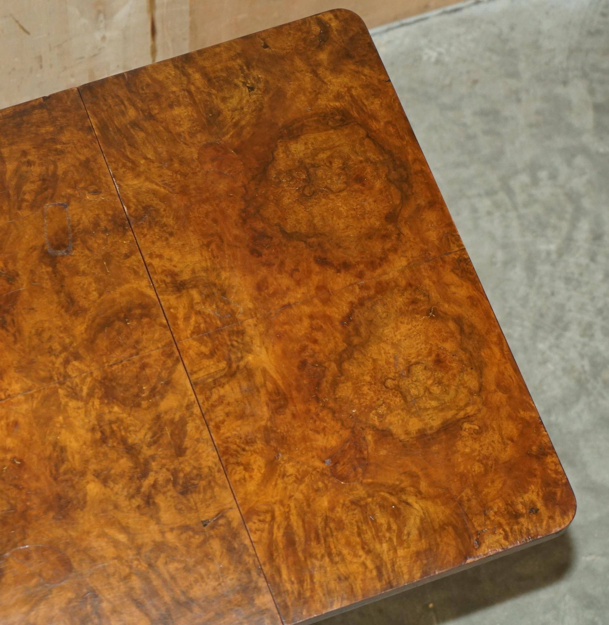 Antique extendable coffee table circa 1880 in solid walnut.