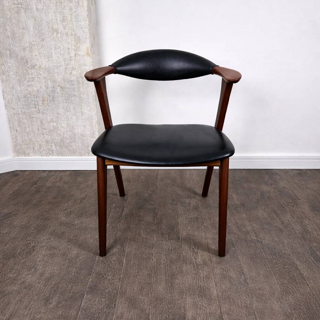 Teak chair with faux leather, model 49 by Erik Kirkegaard for Høng Møbelfabrik, Denmark, 1960.