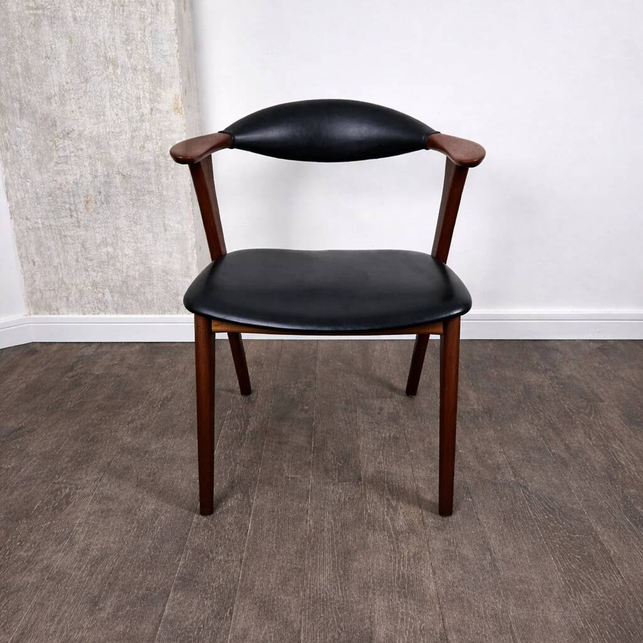 Teak chair with faux leather, model 49 by Erik Kirkegaard for Høng Møbelfabrik, Denmark, 1960.