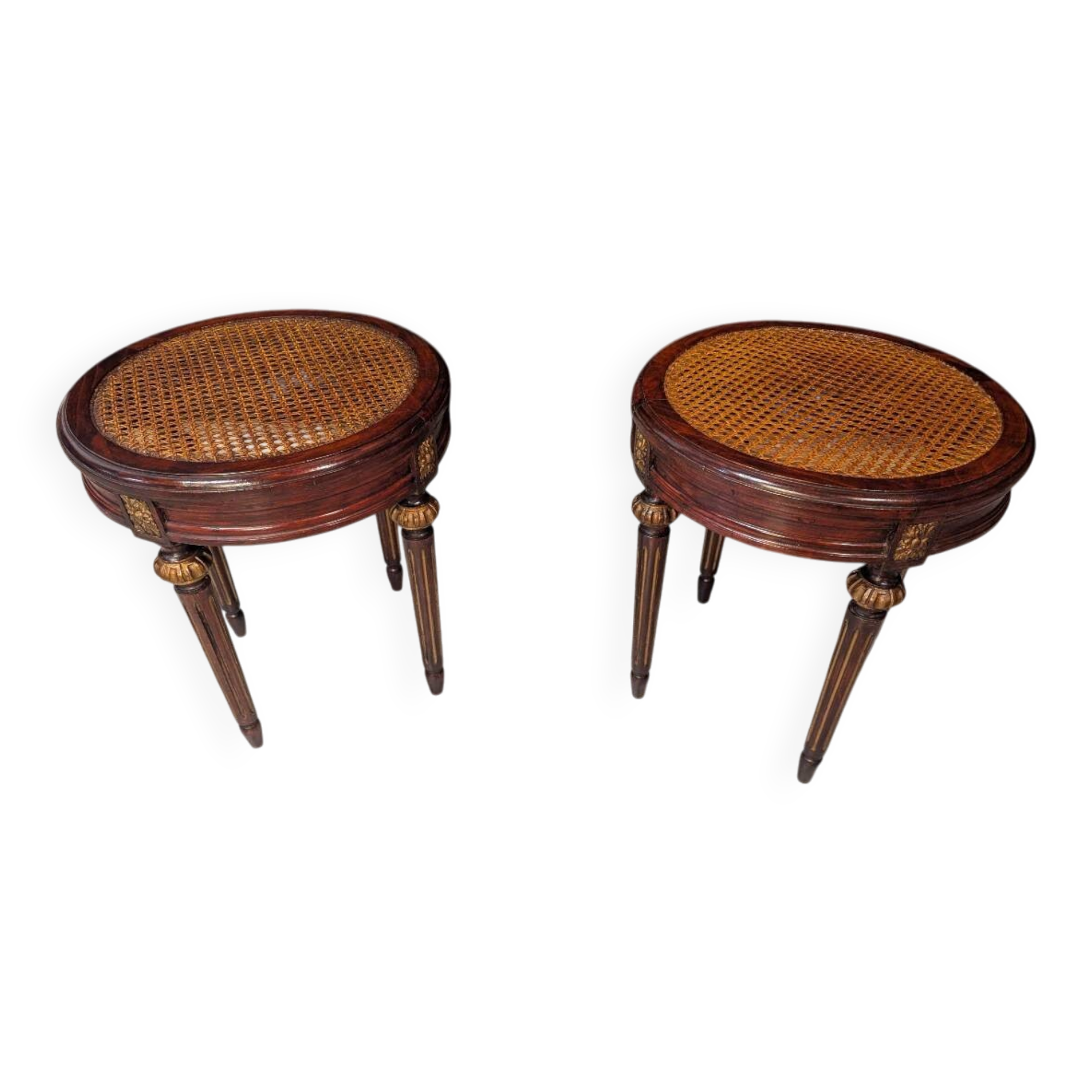 Pair of Louis XVI style stools with caned seats.