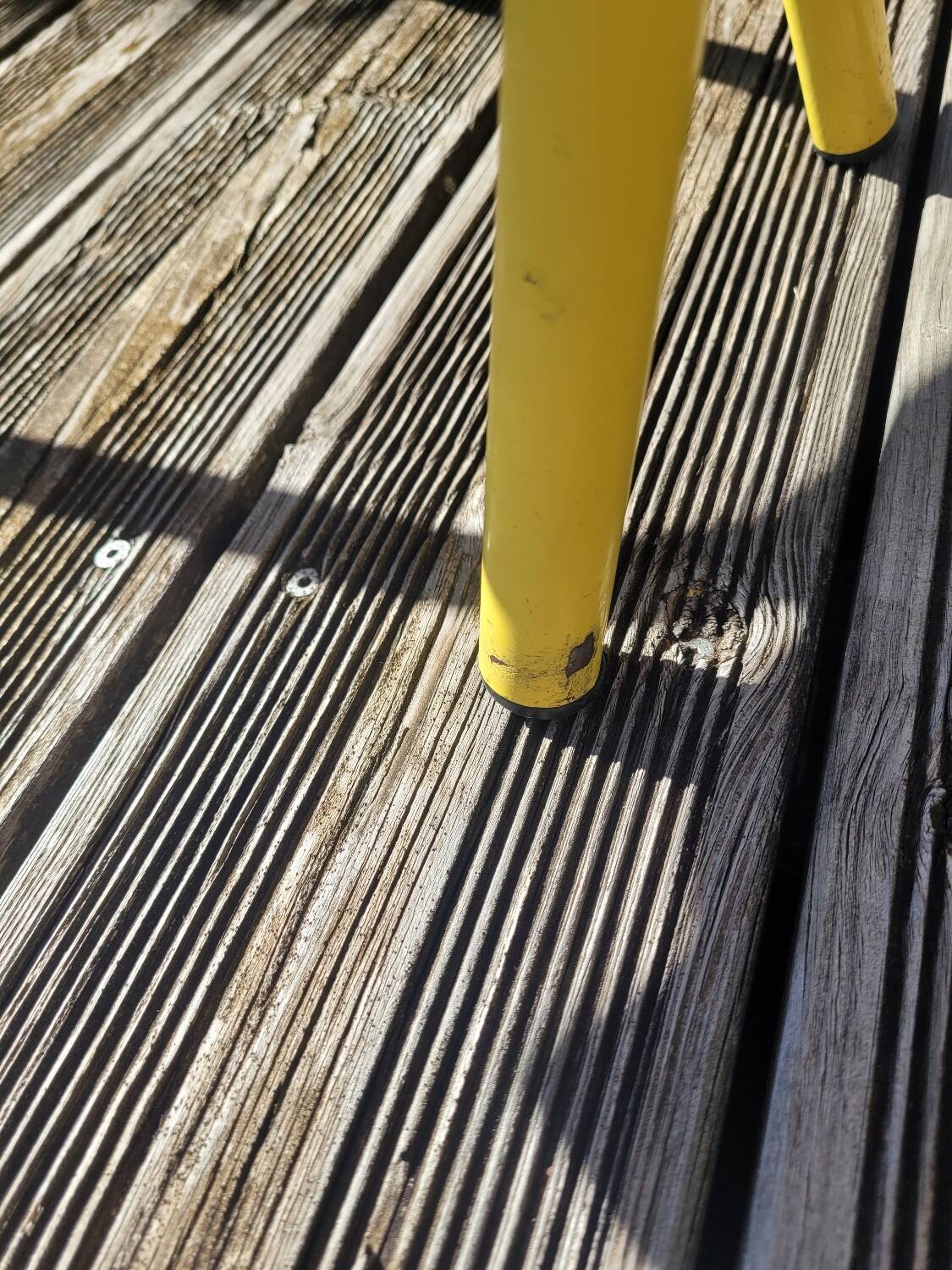 Pair of yellow plywood chairs