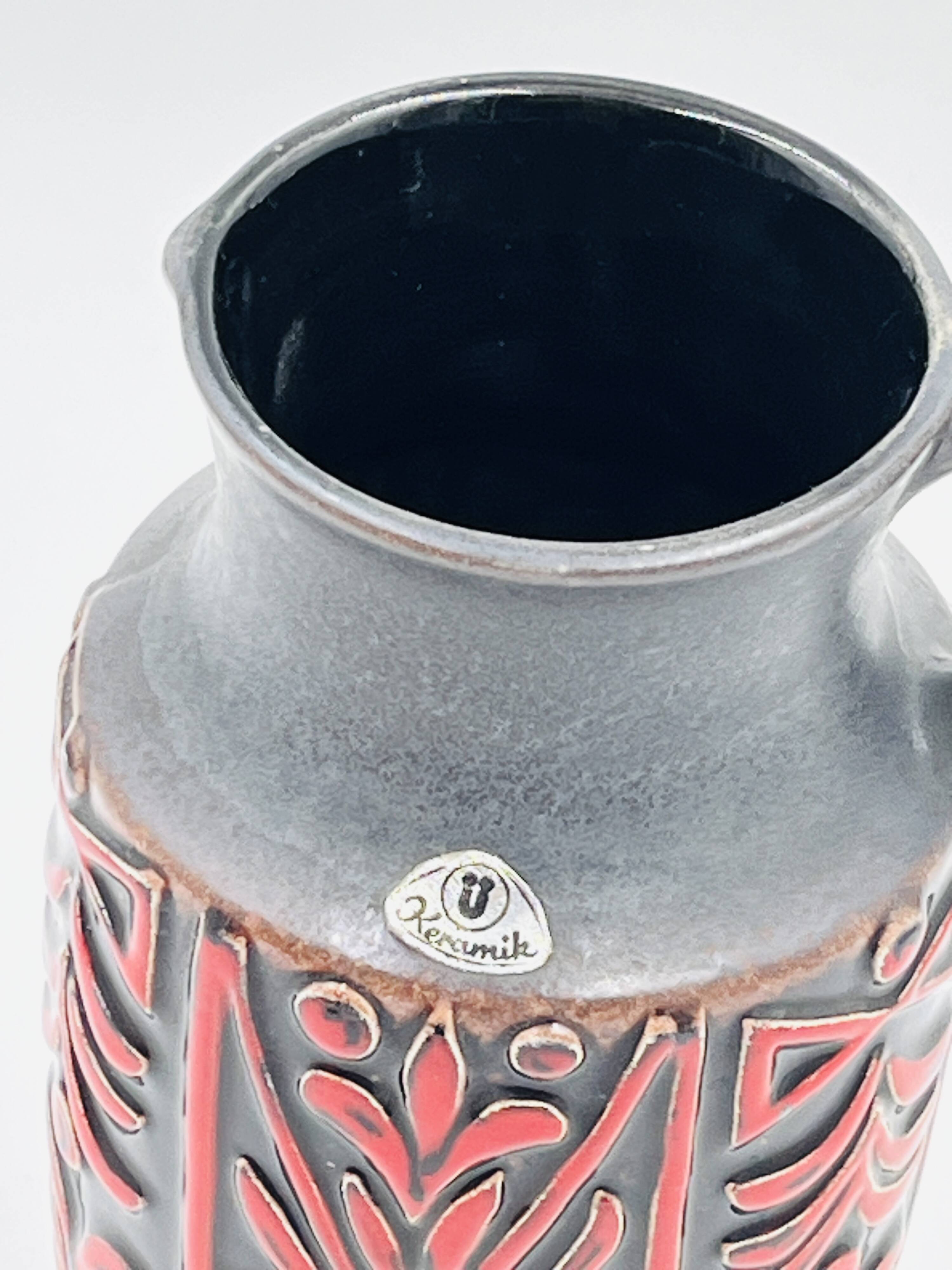 Vase West Germany, ceramic relief, red, 1970s.