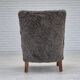 1960s, completely reupholstered Danish art deco armchair, genuine sheepskin "Wellington".