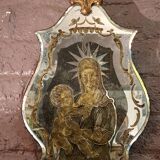 Religious wall light with tassels and eglomised glass