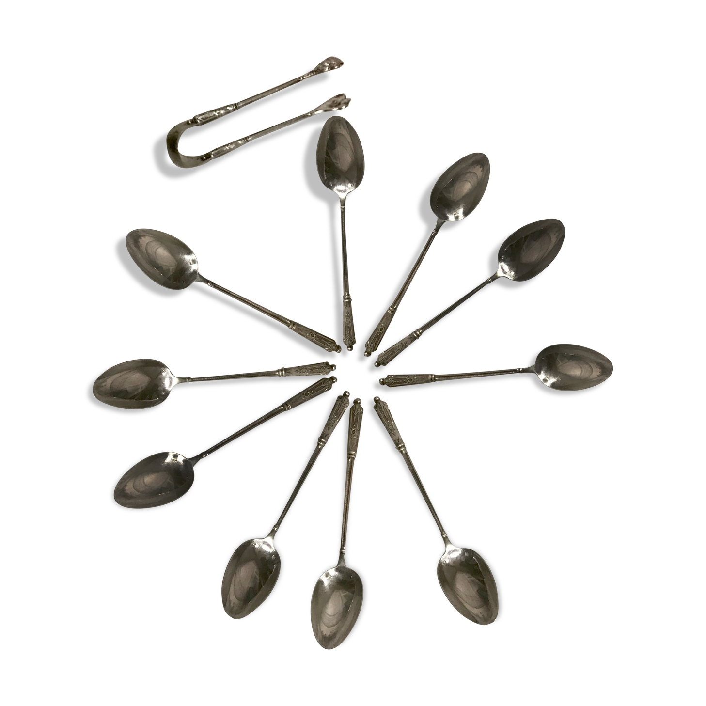 12 teaspoons silver metal
