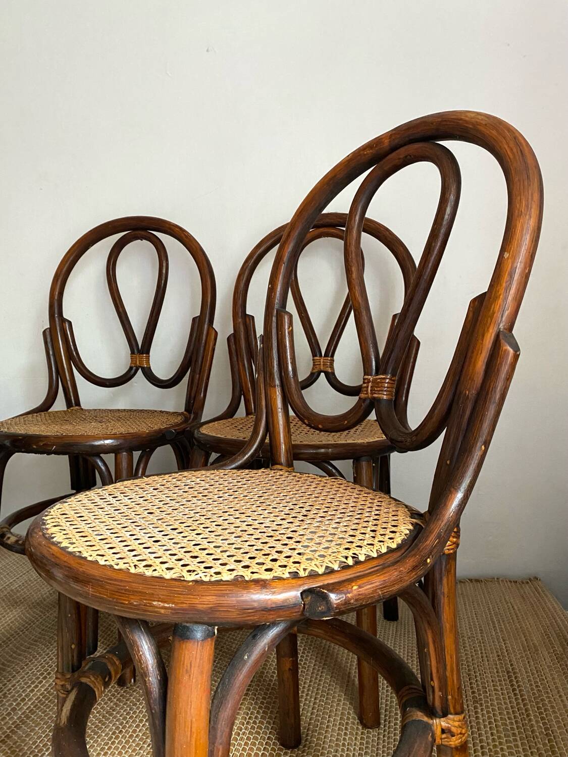 Rattan and cane bistro chairs