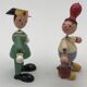 Set of 2 vintage GOULA wooden toy figurines with spring.