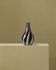 Vintage Murano glass vase from the 1980s, black and white swirl pattern, thick Italian art glass.