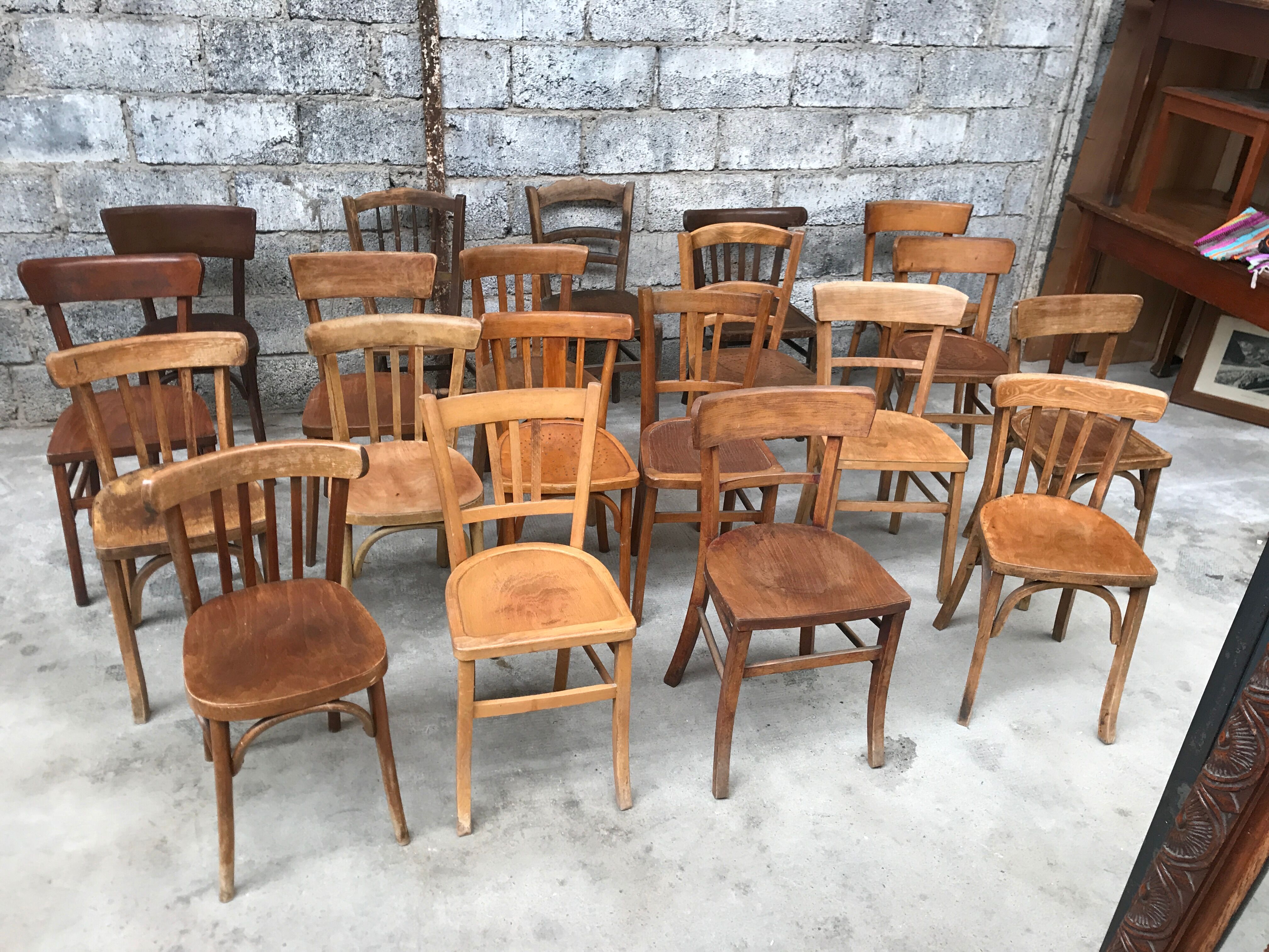 Set of 15 mismatched curved wood bistro chairs
