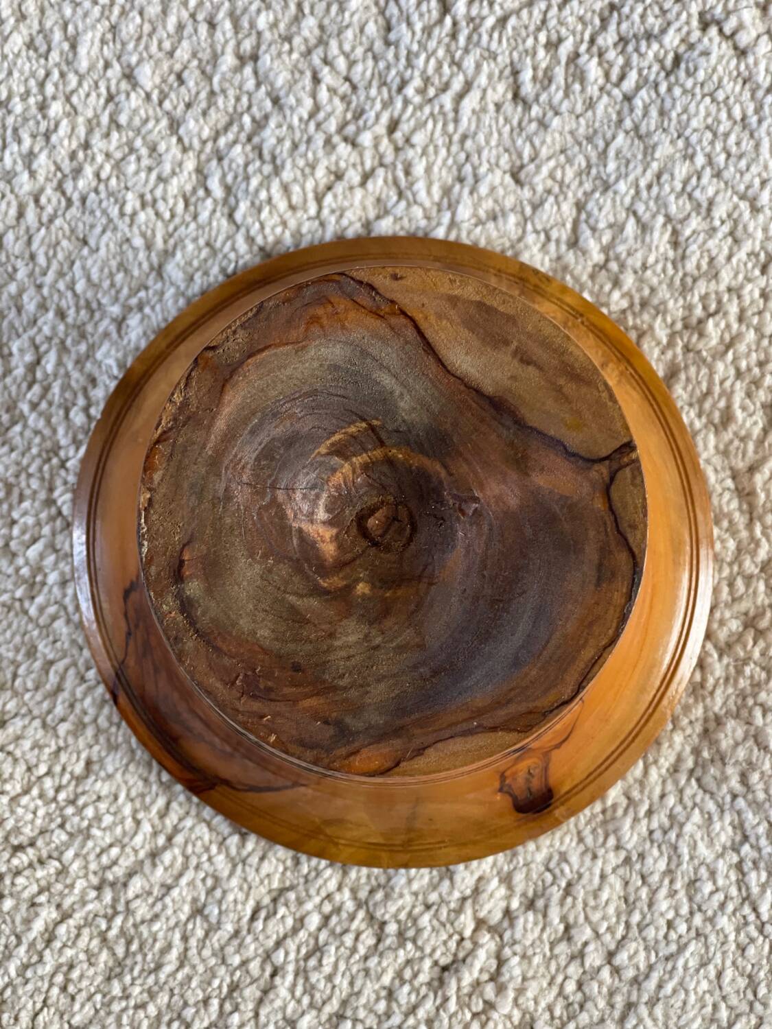 Empty pocket in olive wood