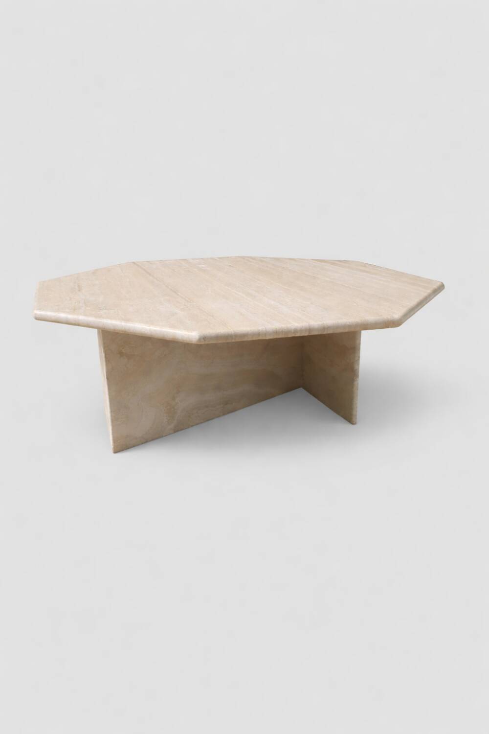 Octagonal coffee table in travertine