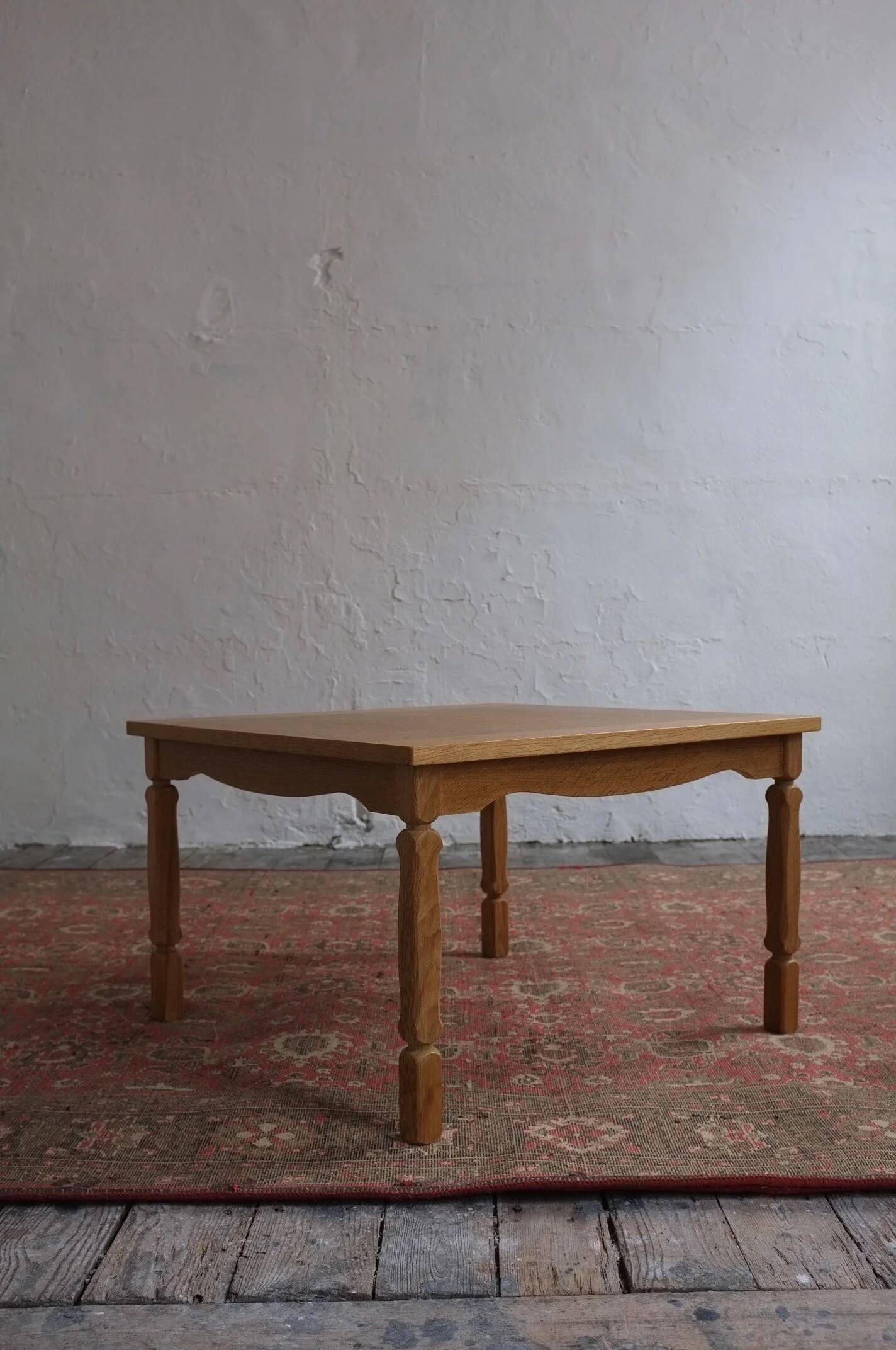 Carved oak square coffee table by Henning Kjaernulf | Denmark | 1950s