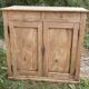 Small Parisian buffet with 2 doors and 2 drawers in light wood.