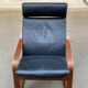 Fauteuil à bascule scandinave bois courbé et cuir marron ikea poang