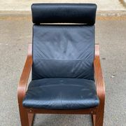Scandinavian rocking chair in curved wood and brown leather from IKEA Poang