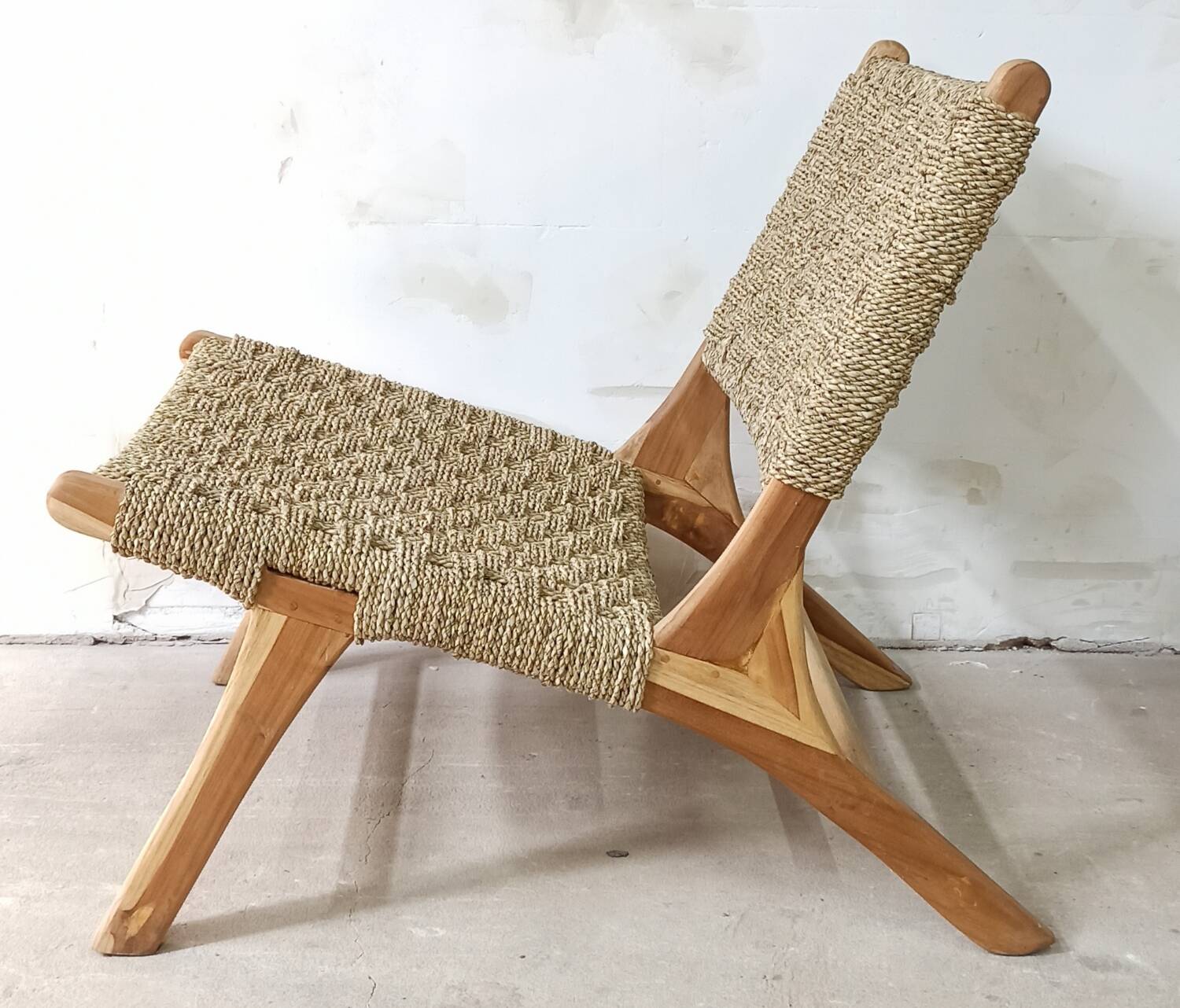 Pair of low armchairs in wood and woven rattan