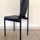 4 postmodern design chairs in black metal and leather, 1980's