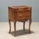 Antique baroque bedside table in walnut, olive wood, Italy, 18th century.
