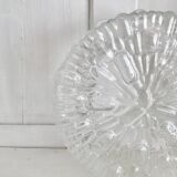 Two round molded glass ceiling lights