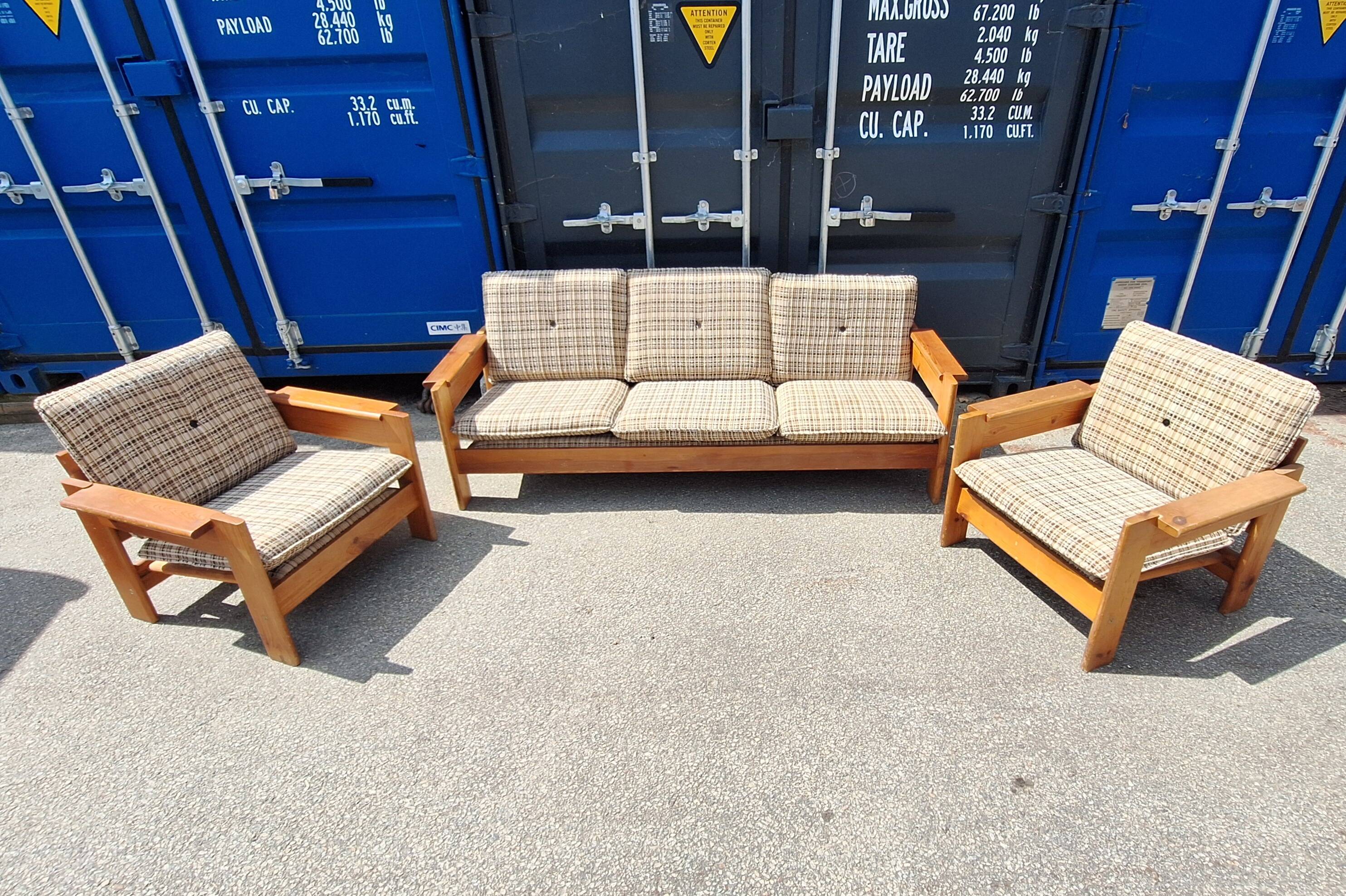 Brutalist-style bench and armchairs in 1970s pine.