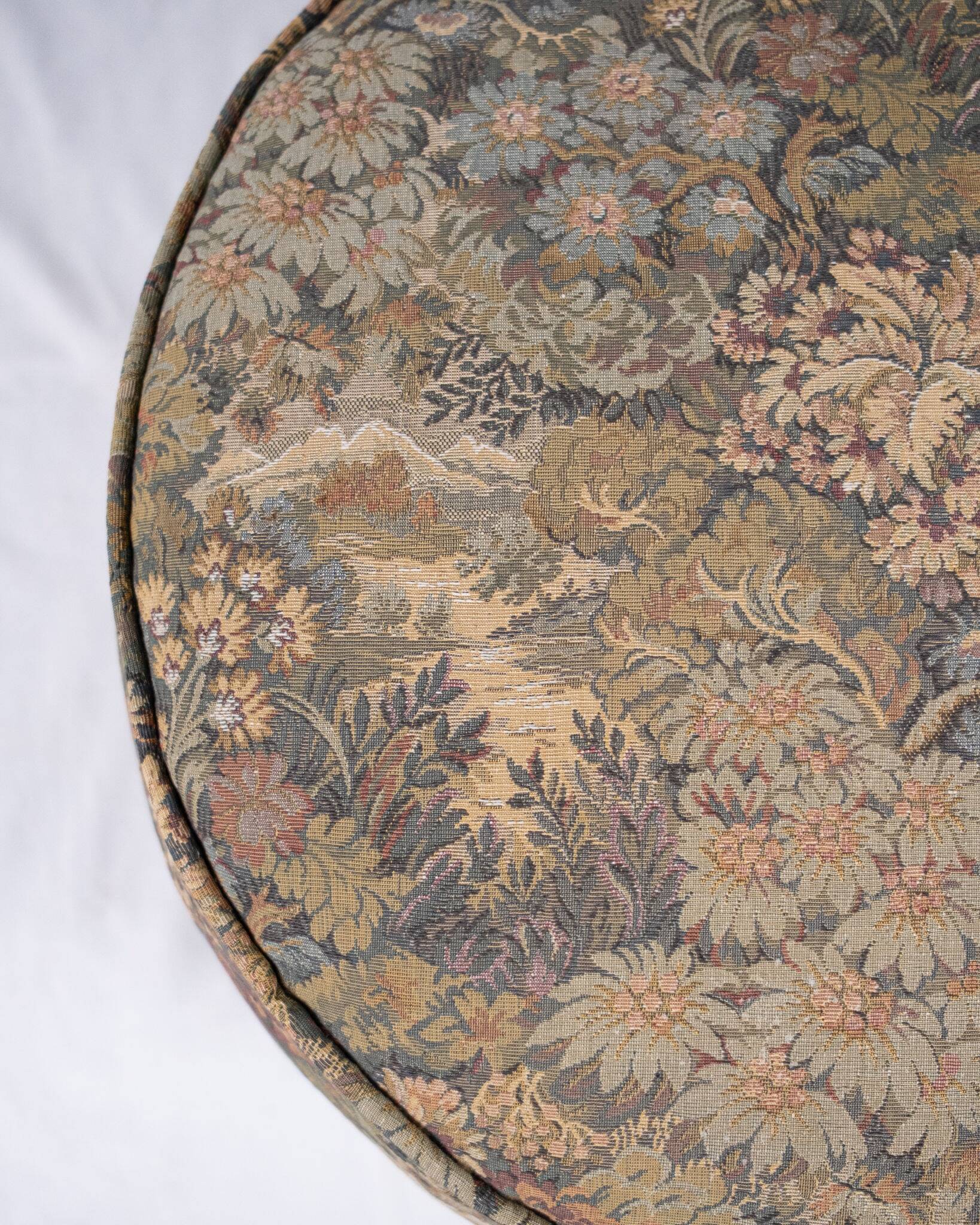 Upholstered pouf in verdure tapestry style, France, late 19th century.