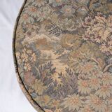 Upholstered pouf in verdure tapestry style, France, late 19th century.
