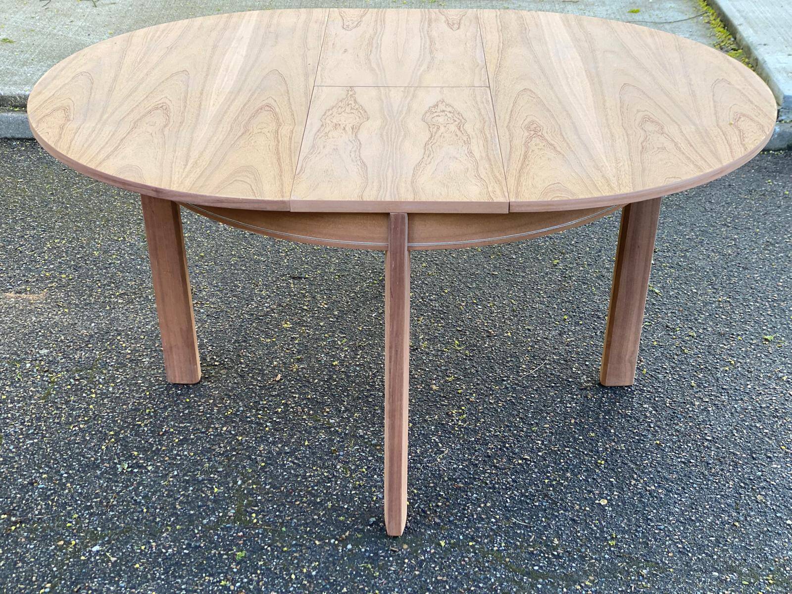 Renovated round extendable Scandinavian dining table in teak, 153cm.