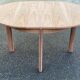 Renovated round extendable Scandinavian dining table in teak, 153cm.