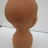 Terracotta vase: child's head