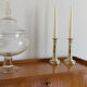 Pair of antique brass push candlesticks