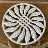 White enameled cast iron trivet