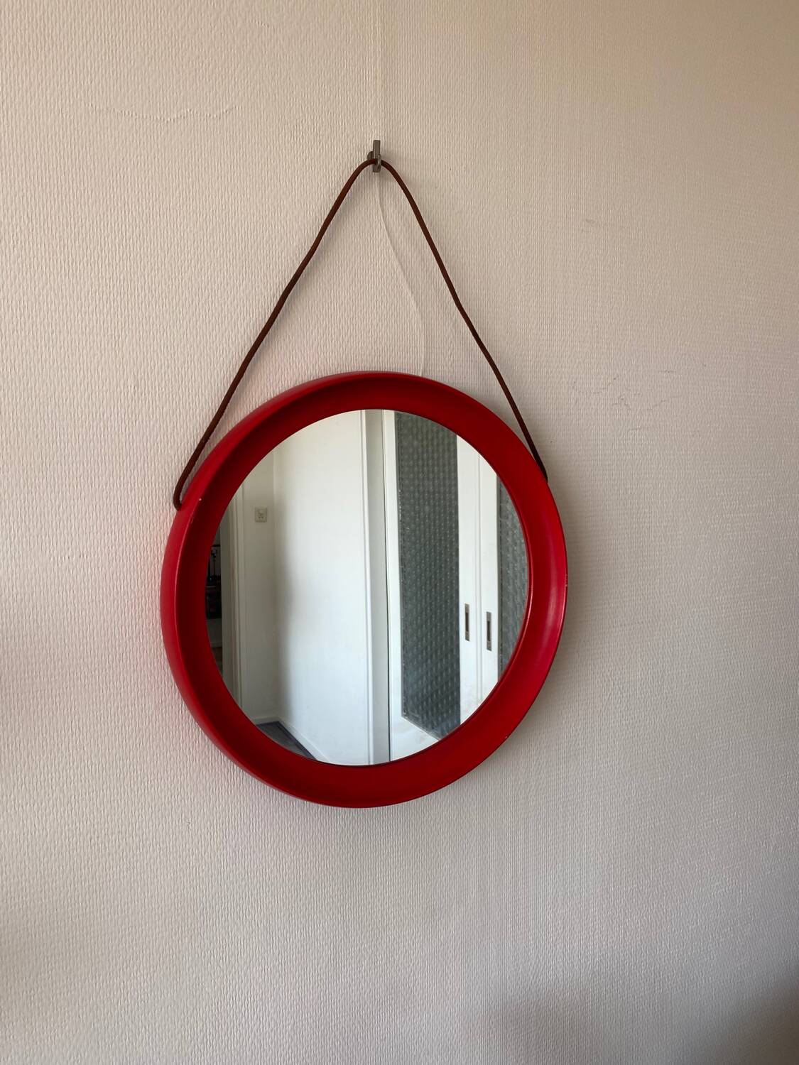 Mid-Century Scandinavian Red Round Wooden Mirror with Leather Strap, 1950s