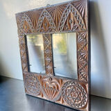 Double frame intricately carved wood