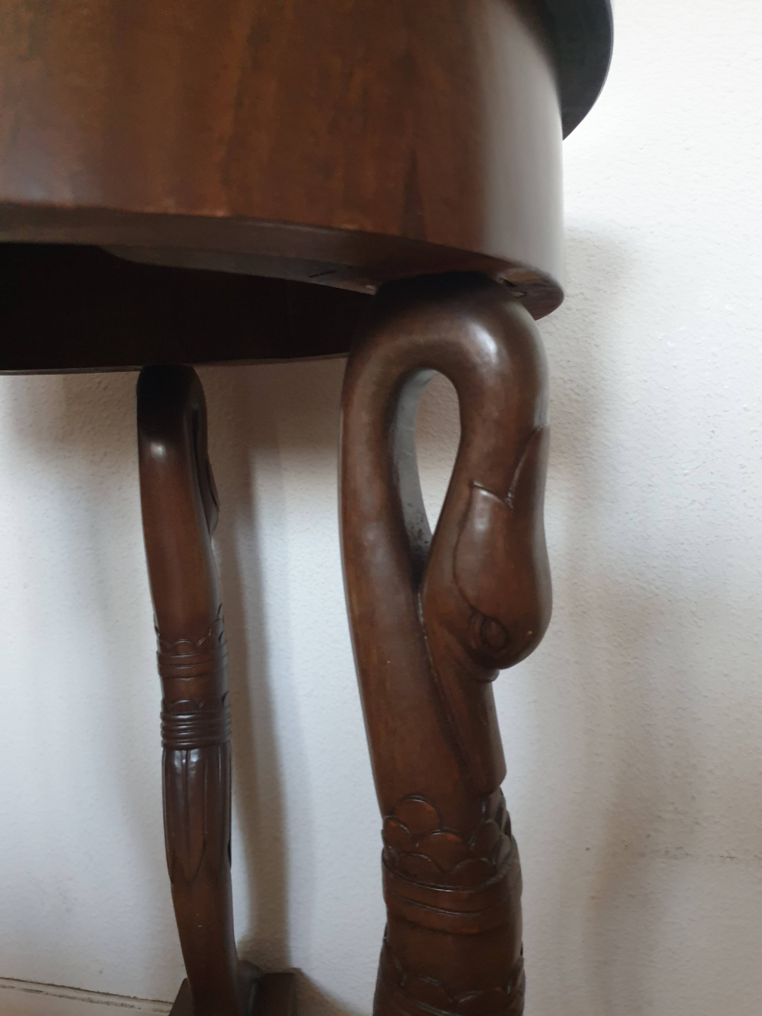 Empire style ceremonial table with mahogany swans