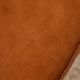 Ottoman with leather upholstery