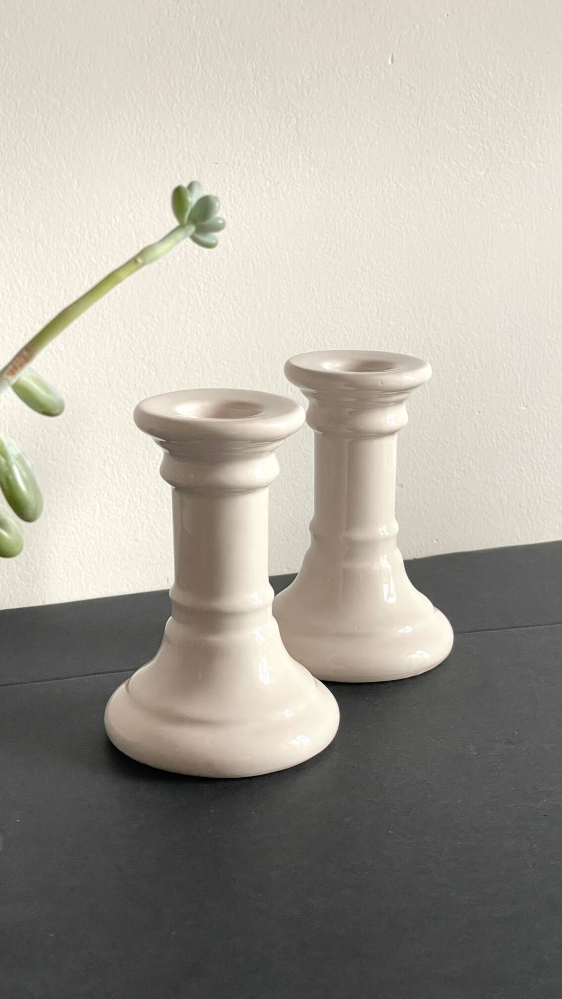 Pair of white ceramic candle holders