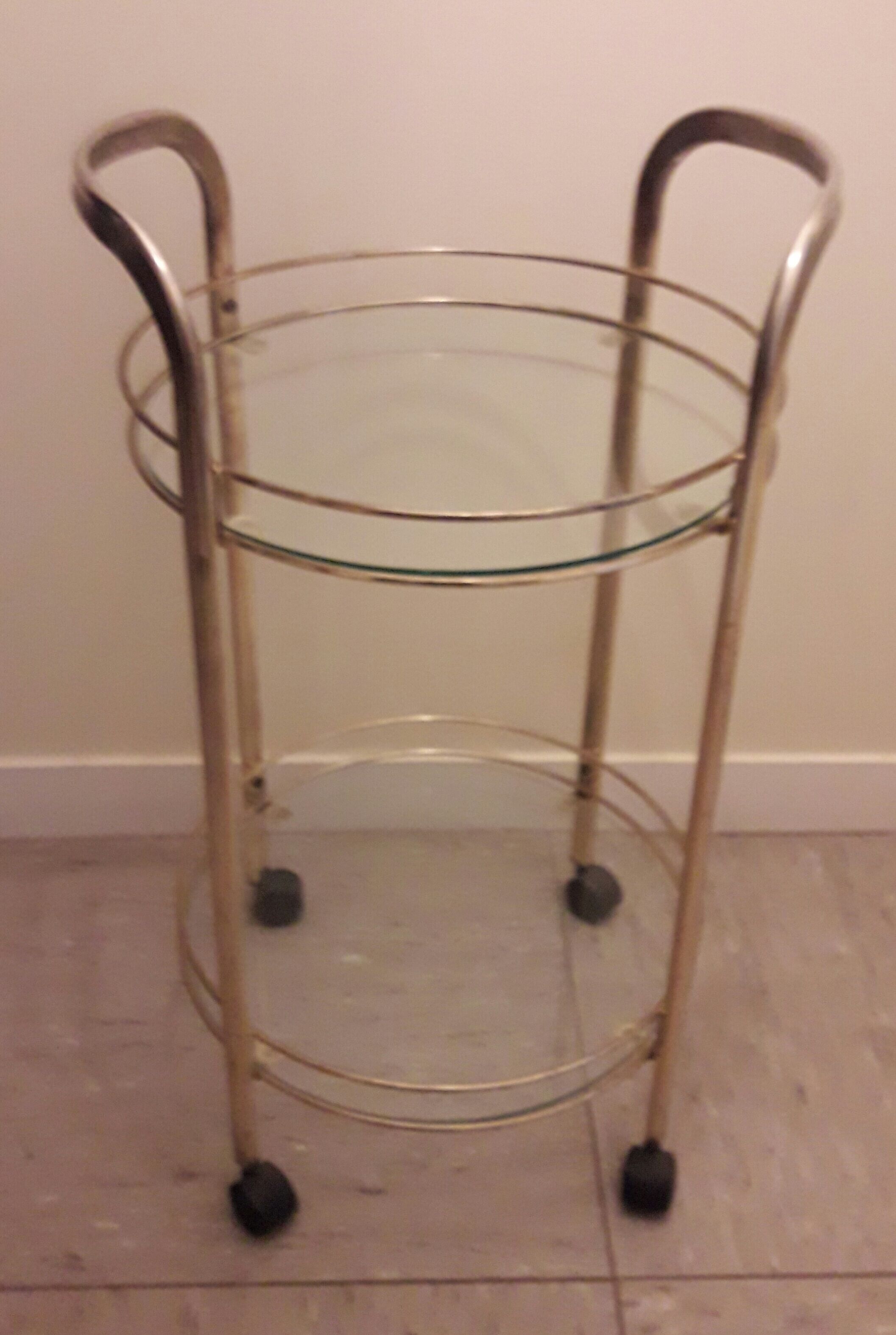 Rolling service in gilded metal and glass