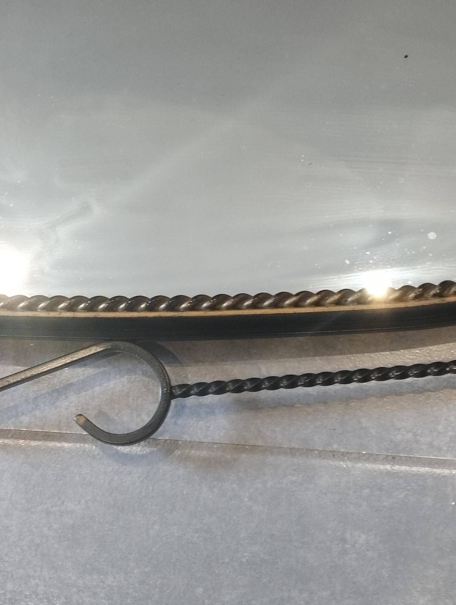 Mid-century modern iron mirror, brutalist, vintage organic, thick sixties.