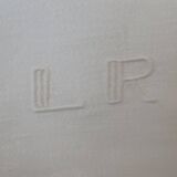 8 Damask napkins. Hand embroidered initials. LR.