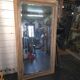Large bevelled floor mirror in oak