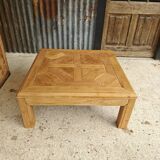 Square coffee table with a drawer in cherry wood.