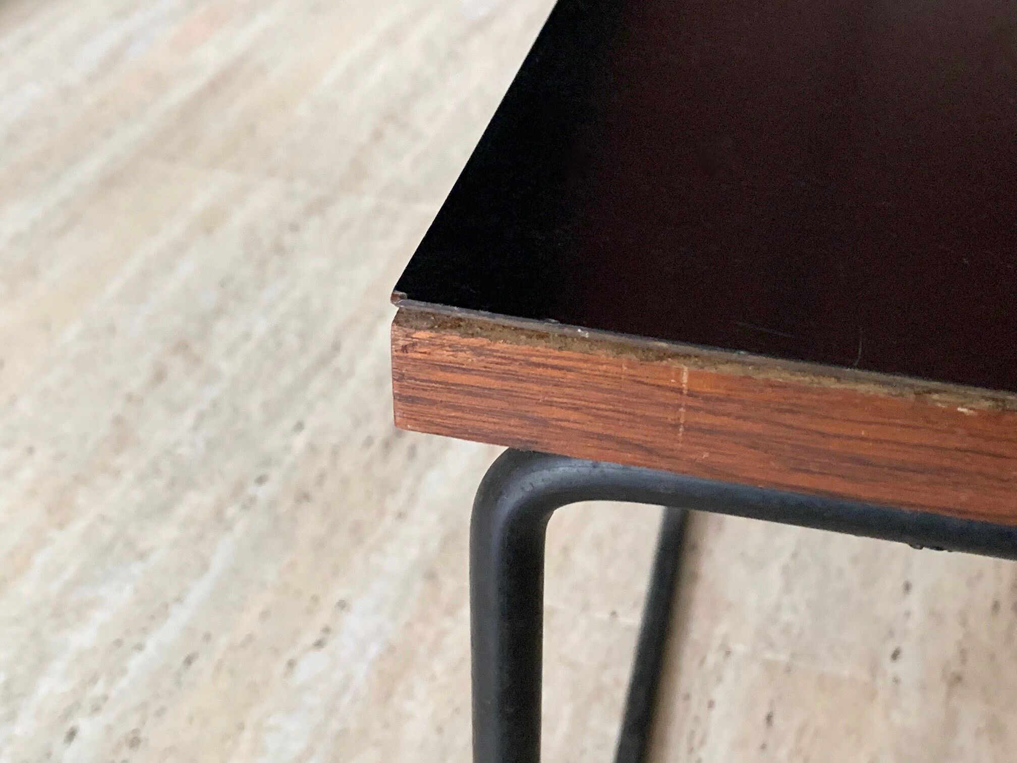 Black "flying" coffee table by Pierre Guariche for Steiner